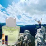 A bottle of perfume on top of a mountain.