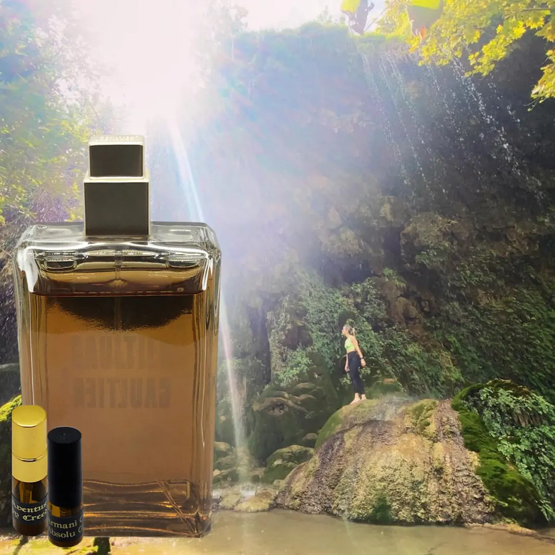 A bottle of perfume sitting on top of a table.