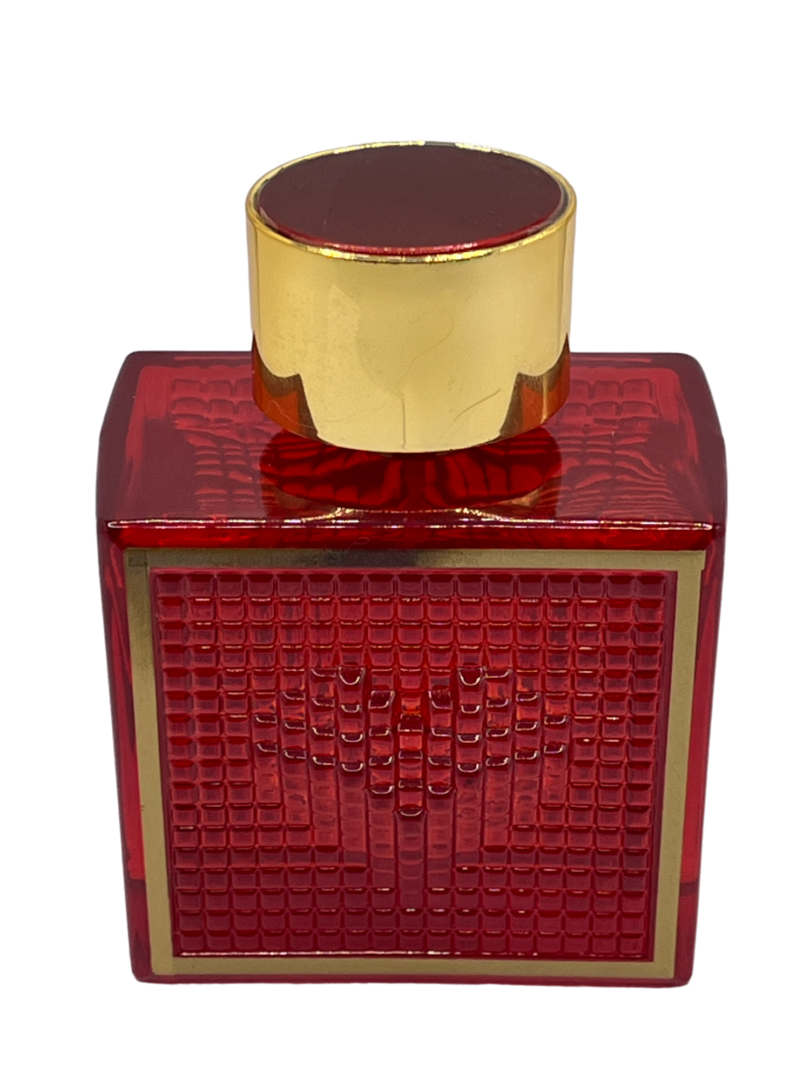 A red bottle of perfume with gold lid.